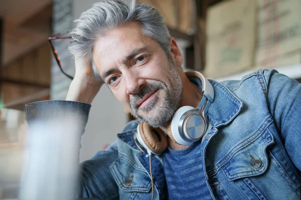 Man with grey hair posing — Stock Photo, Image