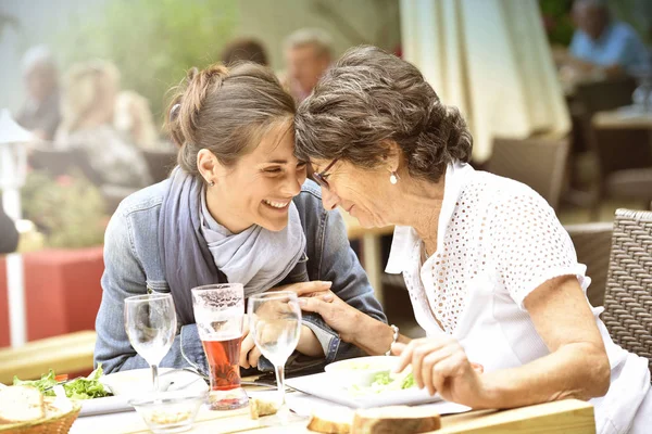 Woman with home carer having lunch — Stock Photo, Image