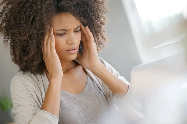 Mixed race woman having a headache — Stock Photo, Image