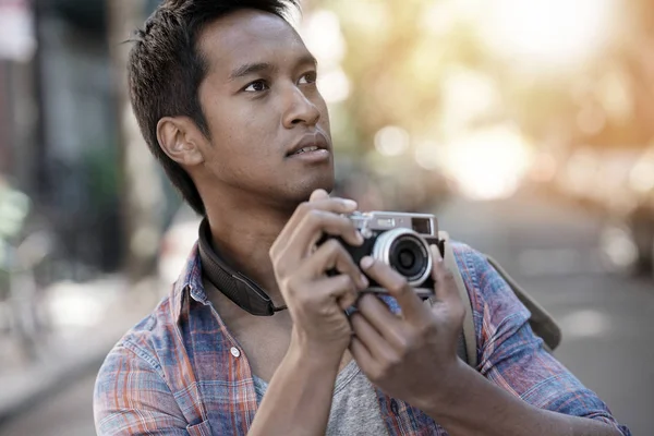 Young man taking picture — Stock Photo, Image