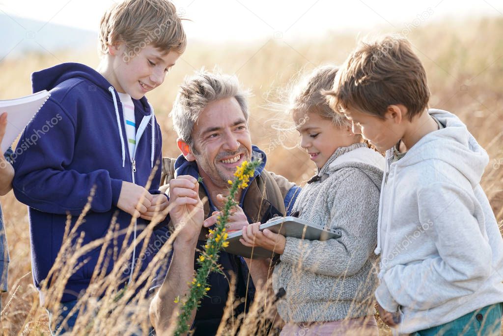 Teacher taking kids to countryside 