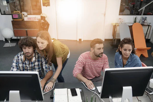 Start-up people working on desktop — Stock Photo, Image