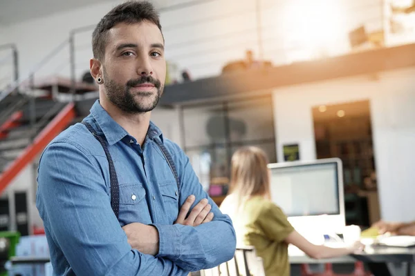 Modern guy in startup office