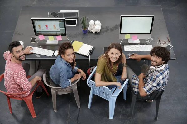 people working in open co-working office