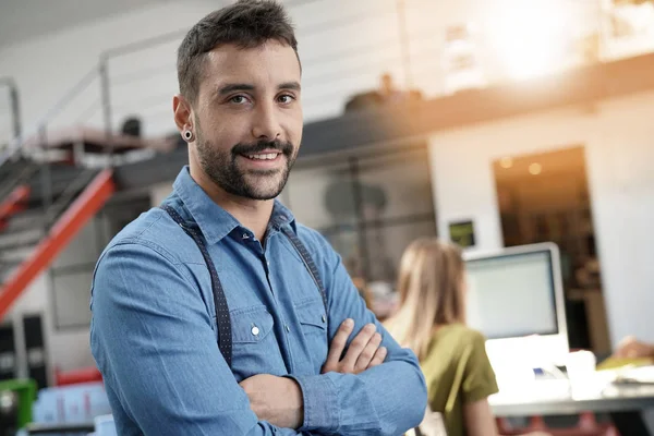 Modern guy in startup office