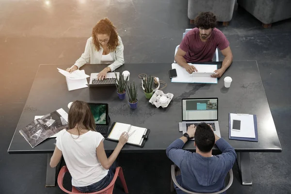 Upper view of start-up people working