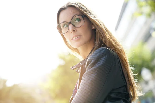 Girl with eyeglasses standing — Stock Photo, Image