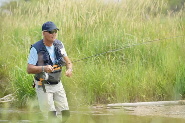 Fly Fisherman — стоковое фото