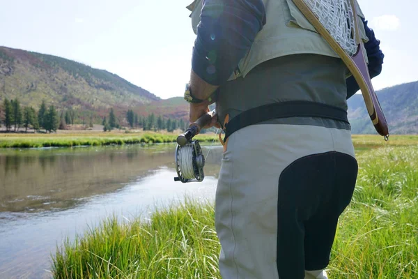 Fly fisherman fishing in Madison river — Stock Photo, Image