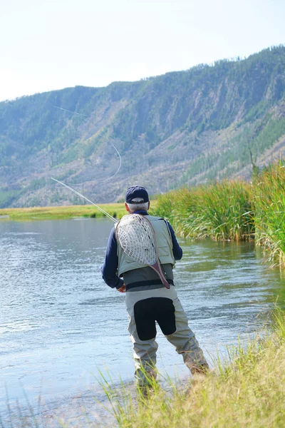 Pesca con mosca en el río Madison — Foto de Stock