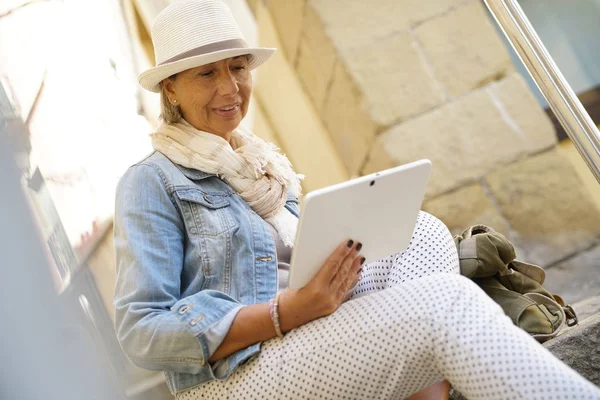 woman  using digital tablet