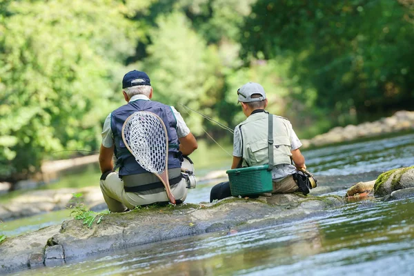Apa és fia legyező horgászat — Stock Fotó