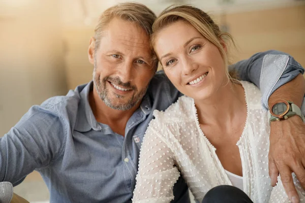 Mature couple relaxing at home