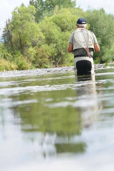 Fly-fisherman fishing in the Gallatin River Stock Image