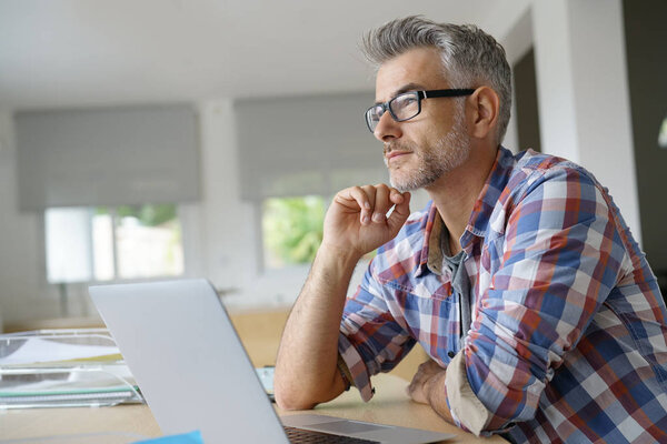 Businessman working on laptop