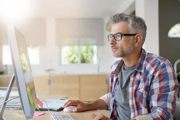 Web designer working in office 