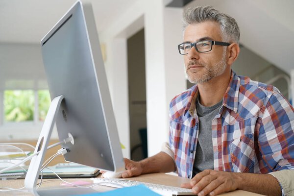 Web designer working in office 