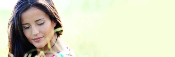 Beautiful young woman in nature - banner template web