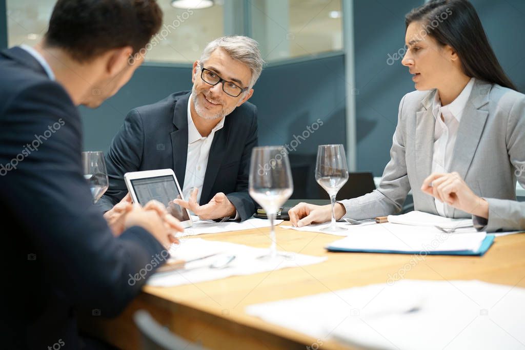 Executive people doing business report presentation in restaurant