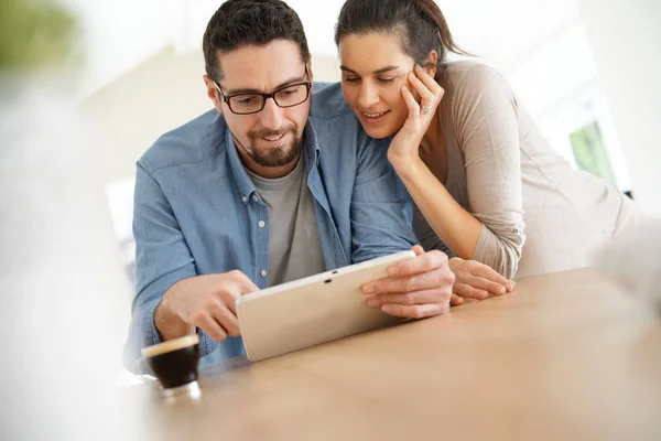 Couple Home Websurfing Digital Tablet Stock Picture