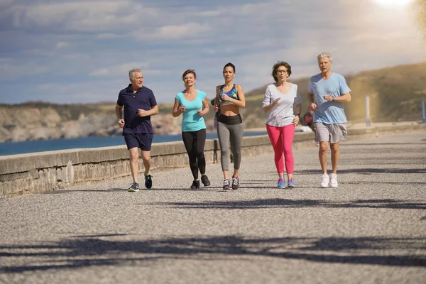 Senior People Sports Coach Running Sandy Beach — Stock Photo, Image