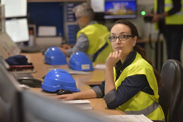 Industrial technician working in monitoring control room