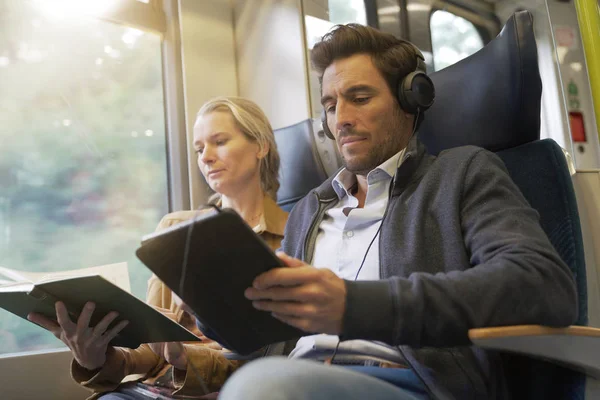 couple traveling in a train