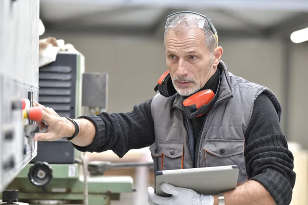 Carpenter Checking Machine Workshop — Stock Photo, Image