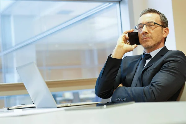 Businessman Modern Office Talking Phone — Stock Photo, Image