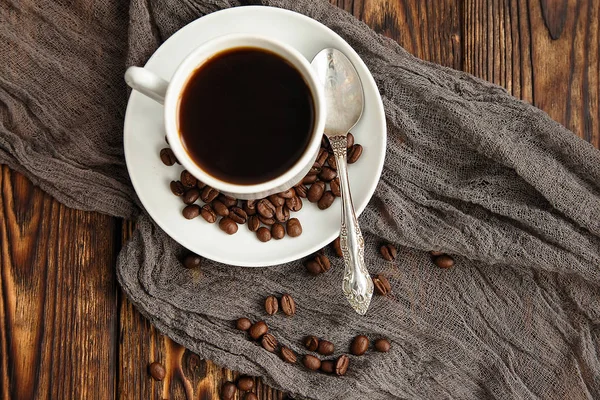 A block from delicious dark chocolate bar pieces on a wooden dark old table — Stock Photo, Image