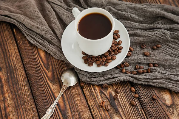 A block from delicious dark chocolate bar pieces on a wooden dark old table — Stock Photo, Image