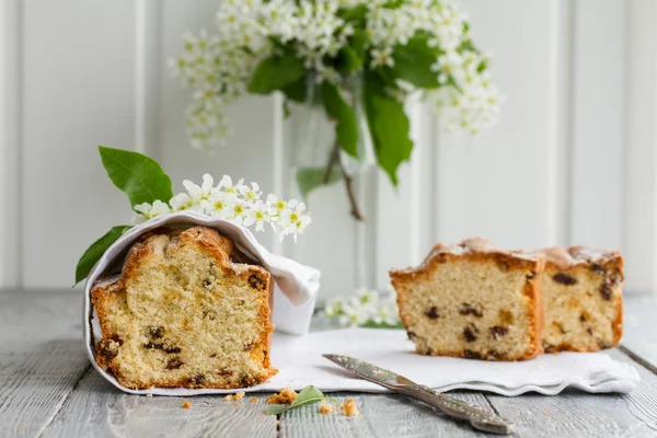 Homemade tasty cut cake with raisins