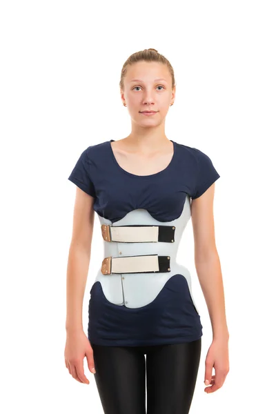 Adolescent patient dans un corset Chenault isolé sur fond blanc — Photo