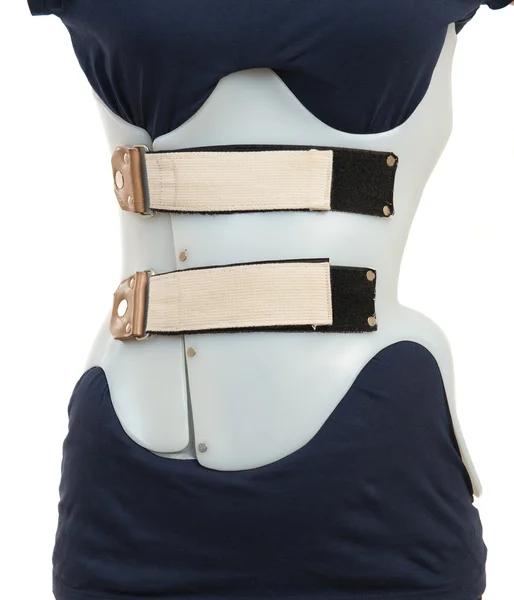 Teenage patient in a corset Chenault isolated on white backgroun — Stock Image Teenage patient in a corset Chenault isolated on white backgroun Stock Photo