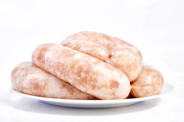 Raw Sausages, Oktoberfest Sausages close-up, isolated on white b — Stock Photo, Image