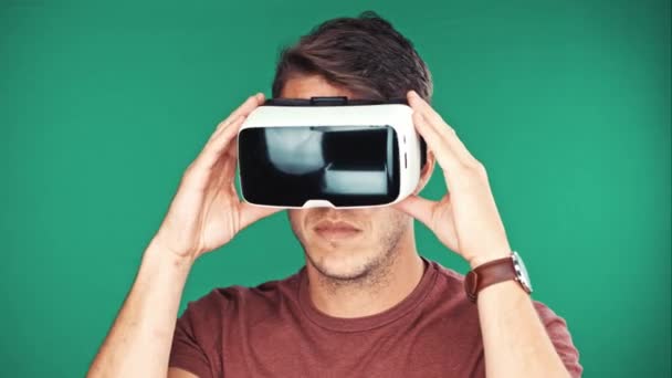 Close up shot of a young man wearing virtual reality googles / VR Glasses — Stock Video