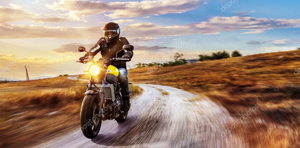 Motorbike on the road riding Stock Photo by ©aa-w 128473728