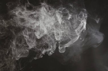 Smoke on black background clipart