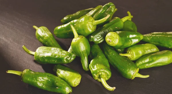 Green peppers background — Stock Photo, Image