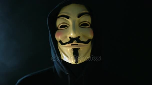 Anonymous computer hacker wearing mask — Stock Video