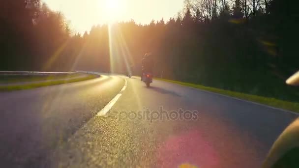 Friends on motorbikes riding on the road — Stock Video