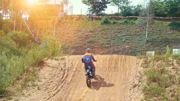 Motocross Rider riding on dirt track — Stock Video
