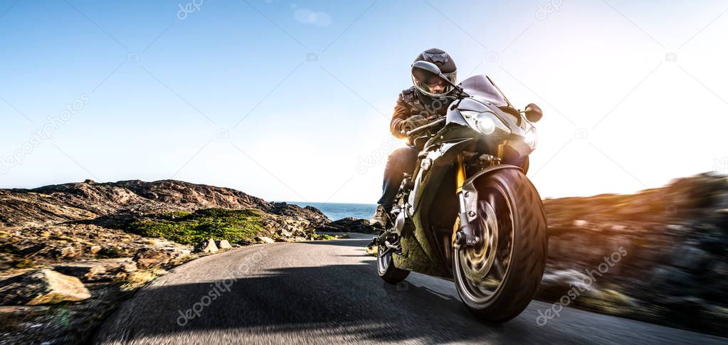 motorbike on the coastal road riding. having fun driving the emp