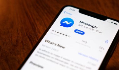 Apple iPhone Xs with Facebook messenger app from app store.
