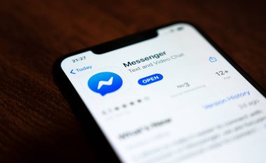 Apple iPhone Xs with Facebook messenger app from app store.