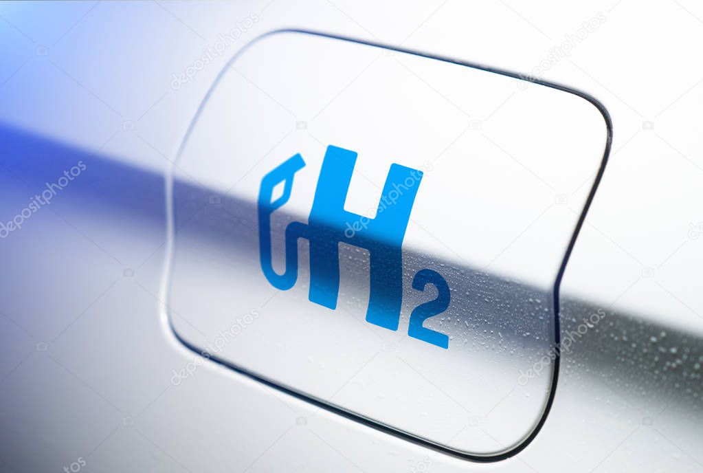 Car with hydrogen logo on filler cap. h2 combustion engine for e