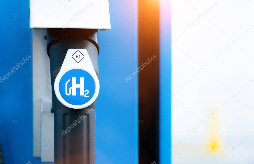 Hydrogen logo on gas stations fuel dispenser. h2 combustion engine for emission free eco friendly transport.