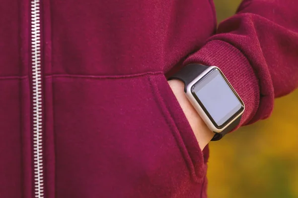 Girl wearing smart-watch on her hand — Stock Photo, Image