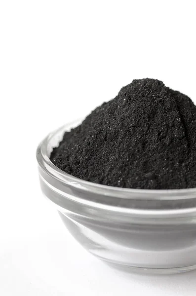 Activated charcoal powder — Stock Photo, Image