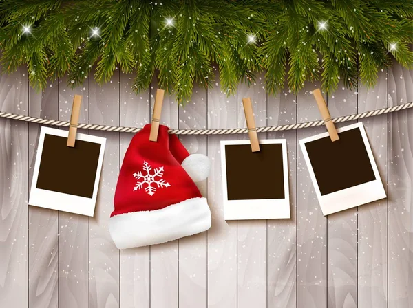 Weihnachten Hintergrund mit Fotos und einem Weihnachtsmann Hut. Vektor. — Stockvektor